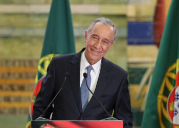 Marcelo Rebelo de Sousa addresses journalists and supporters after winning Portugal's presidential election Sunday, Jan. 24, 2016, in Lisbon. Rebelo de Sousa, a veteran center-right politician who became a popular television personality, recorded an emphatic victory in Portugal's presidential election on Sunday, collecting more than half of the votes against nine rivals as the Portuguese chose a counterweight to the country's center-left Socialist government.