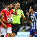 FC Porto's Otavio (R) argues with the referee Joao Pinheiro during their Portuguese First League soccer match against Benfica, held at Dragao stadium, in Porto, north of Portugal, 21 October 2022. JOSE COELHO/LUSA